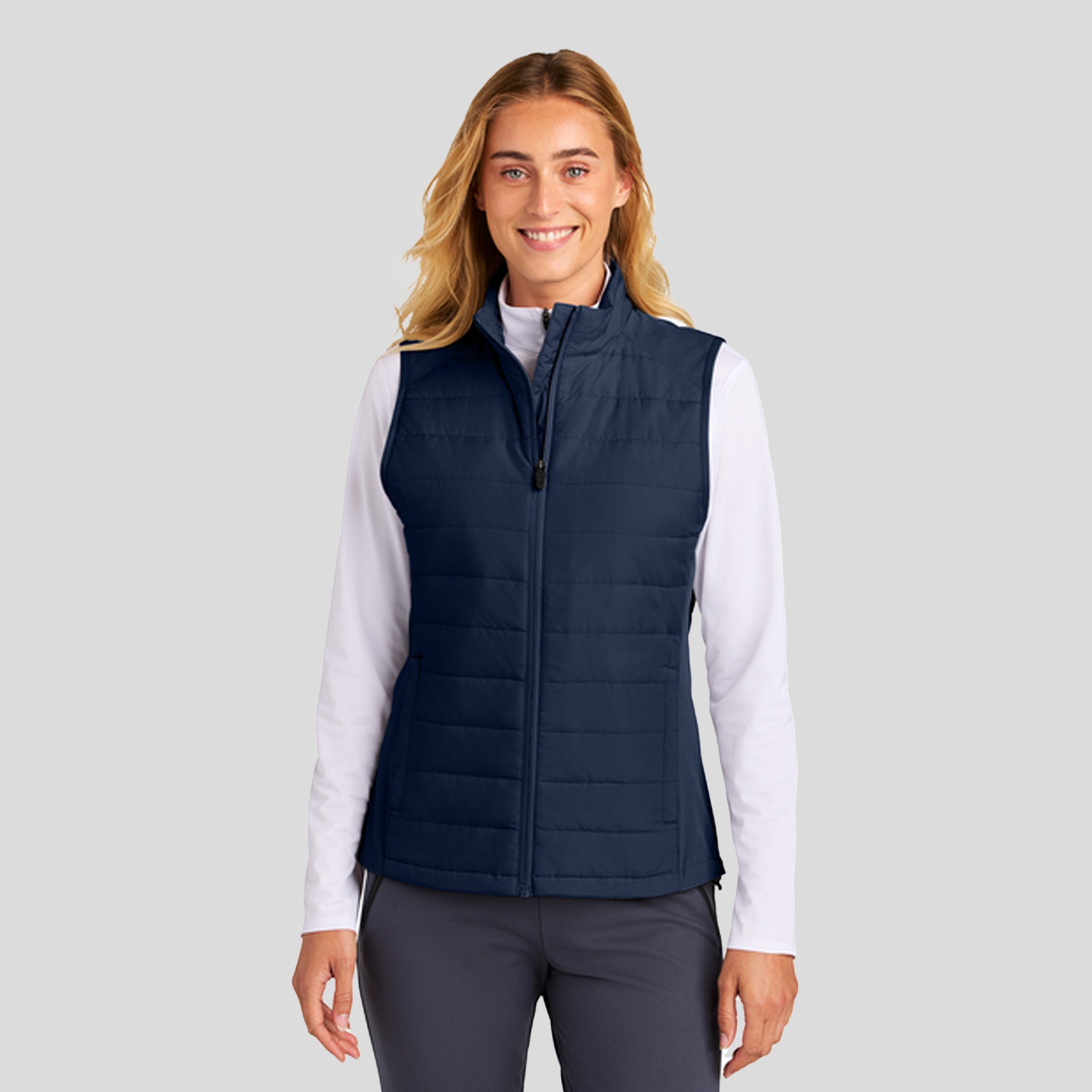 Womenโs Teknical Hybrid Vest | True Navy