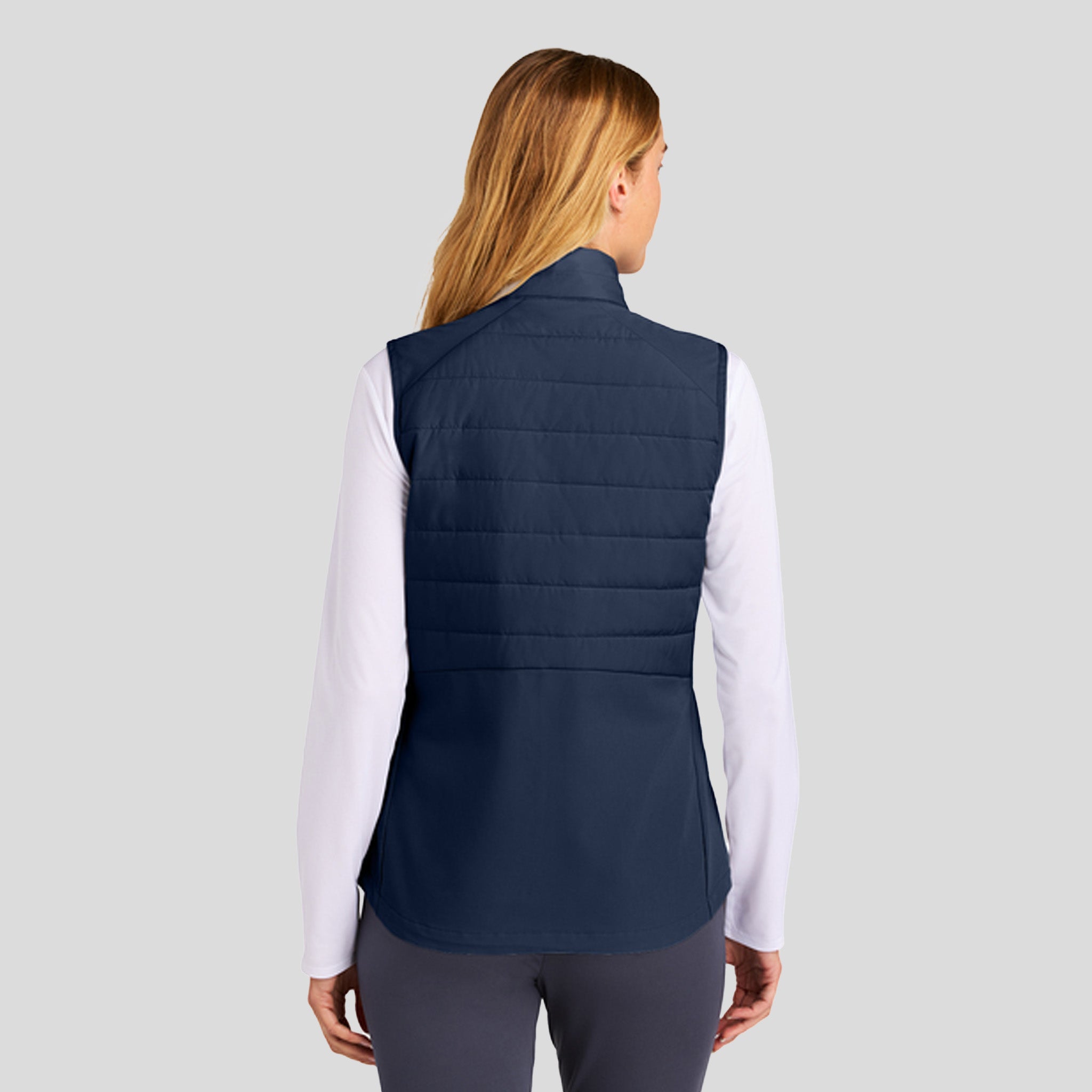 Womenโs Teknical Hybrid Vest | True Navy